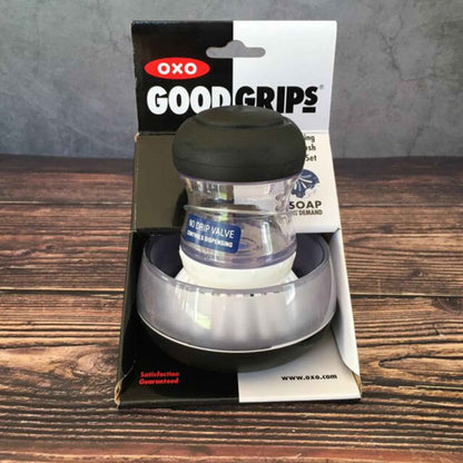 Cepillo Tipo Virutilla Oxo Con Dispensador Soap Con Base OXO- Dermocosmetica_belleza_online