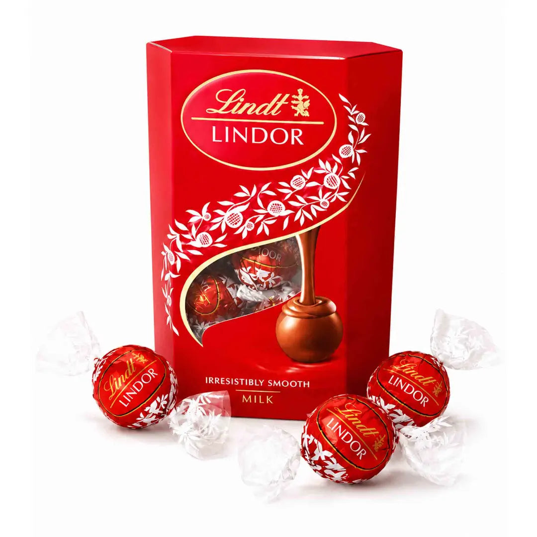 Caja roja de bombones Lindt Lindor Leche 75 g con chocolates envueltos individualmente.